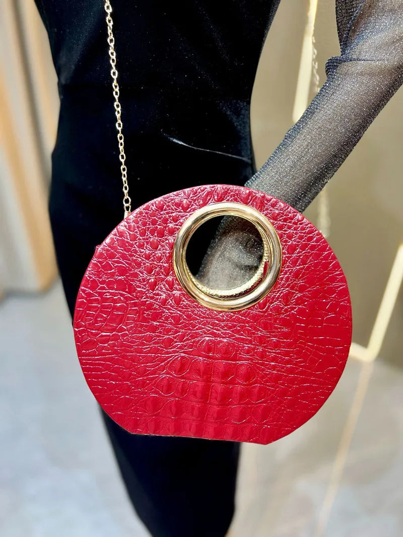 Boss Circle Croc Clutch