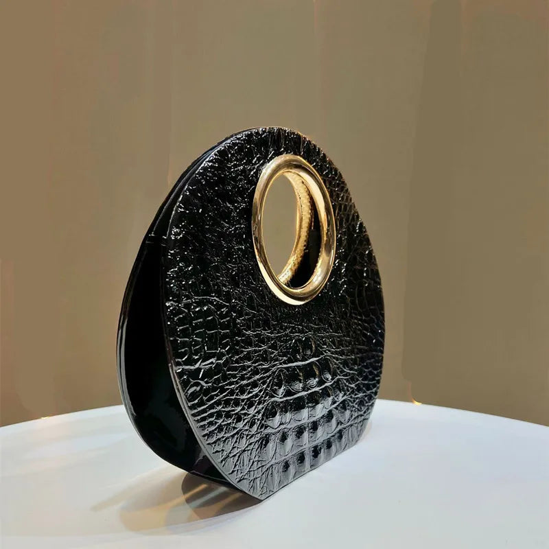 Boss Circle Croc Clutch