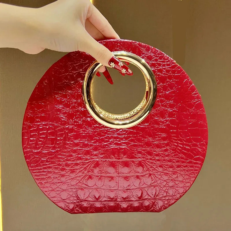 Boss Circle Croc Clutch