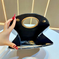 Boss Circle Croc Clutch